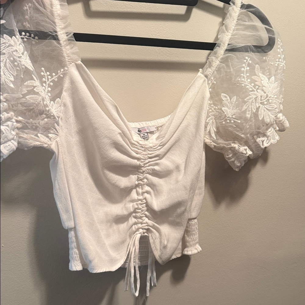 Elegant White Ruched Top with Lace Sleeves